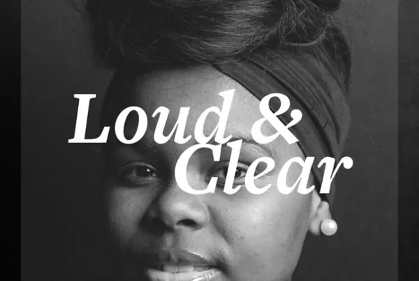 Black-and-white portrait of a woman in a headwrap with the title Loud & Clear.